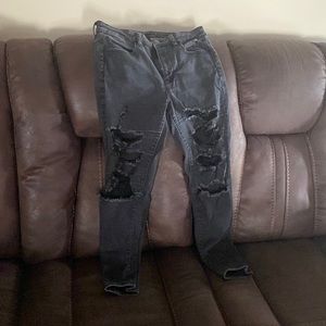 Black American eagle ripped high rise jeans slightly faded